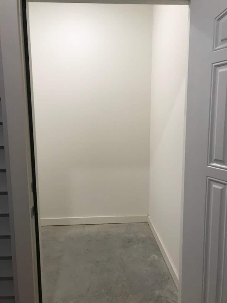 An empty room with a doorway.
